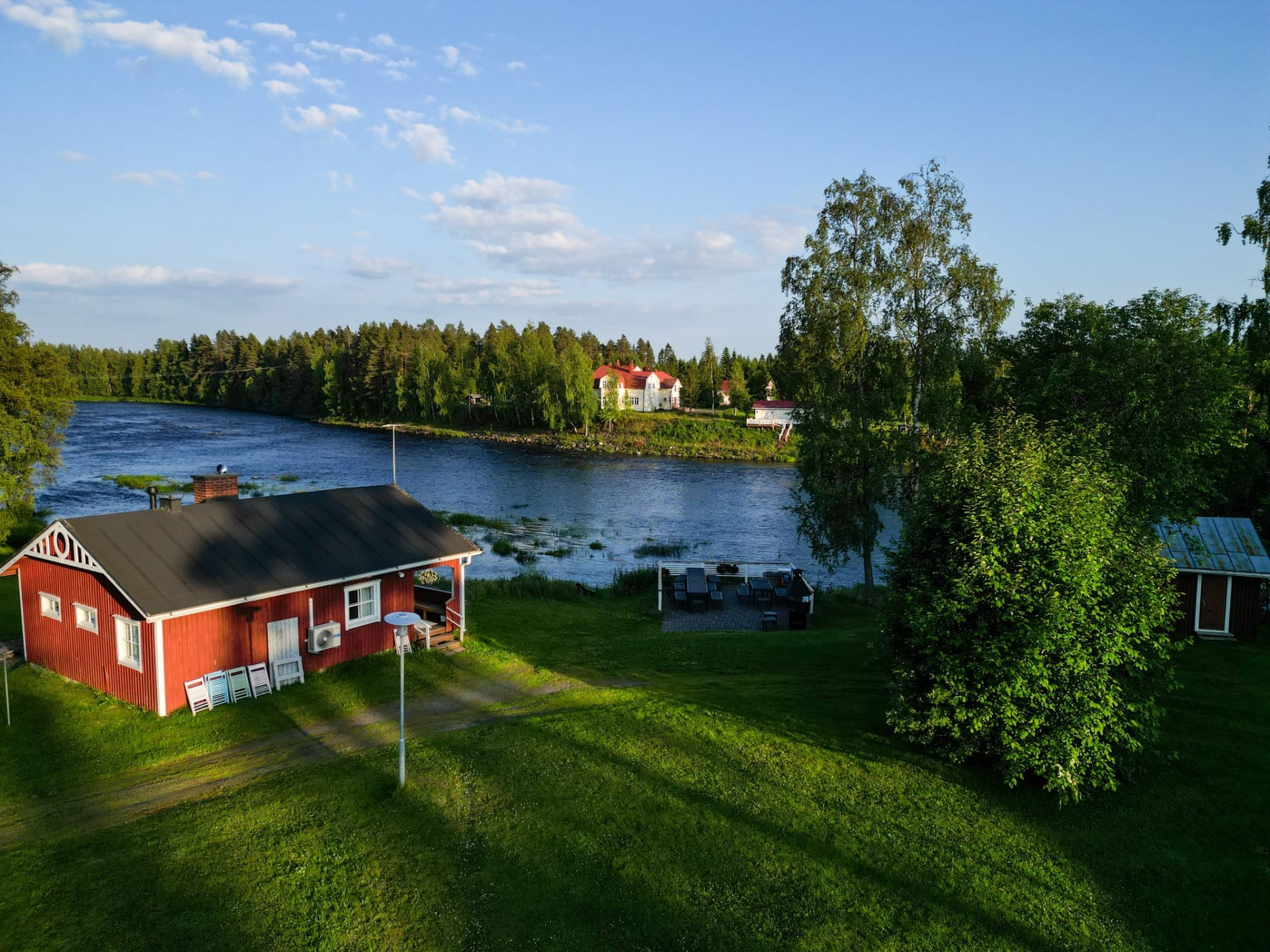 Taiga Resort sauna building by the river