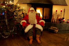 Santa Claus by the Fire