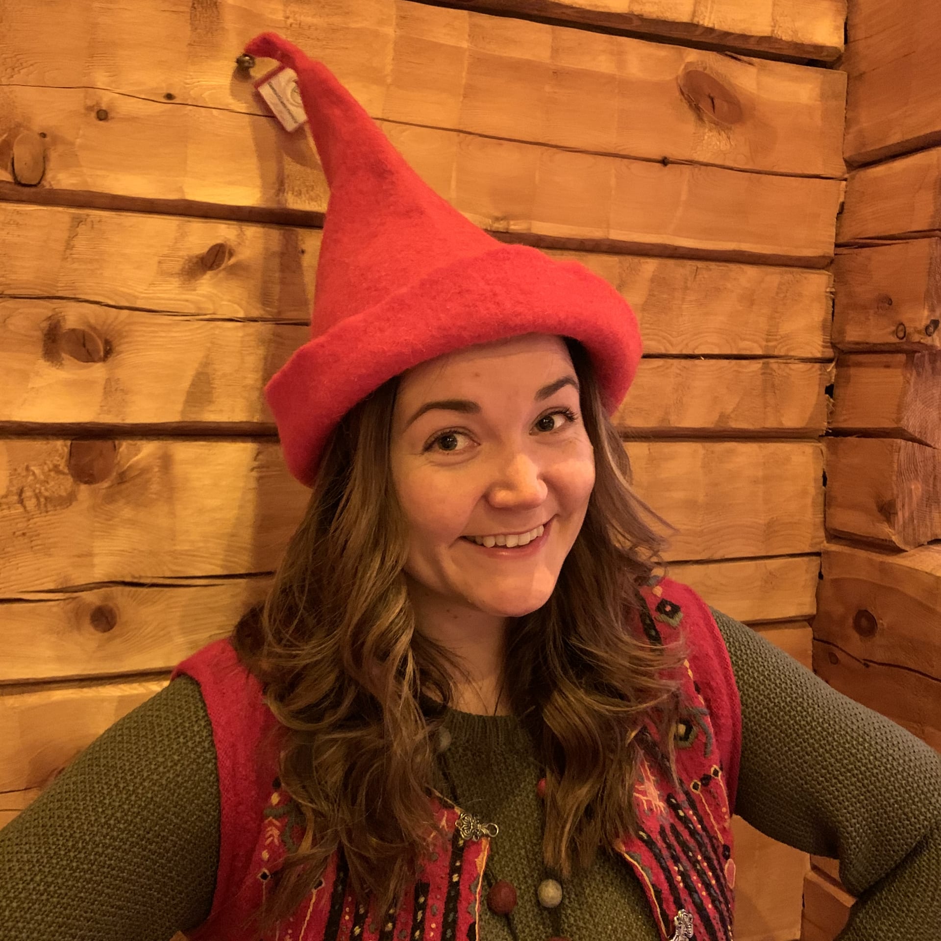 Vanilla the elf wearing red elf hat