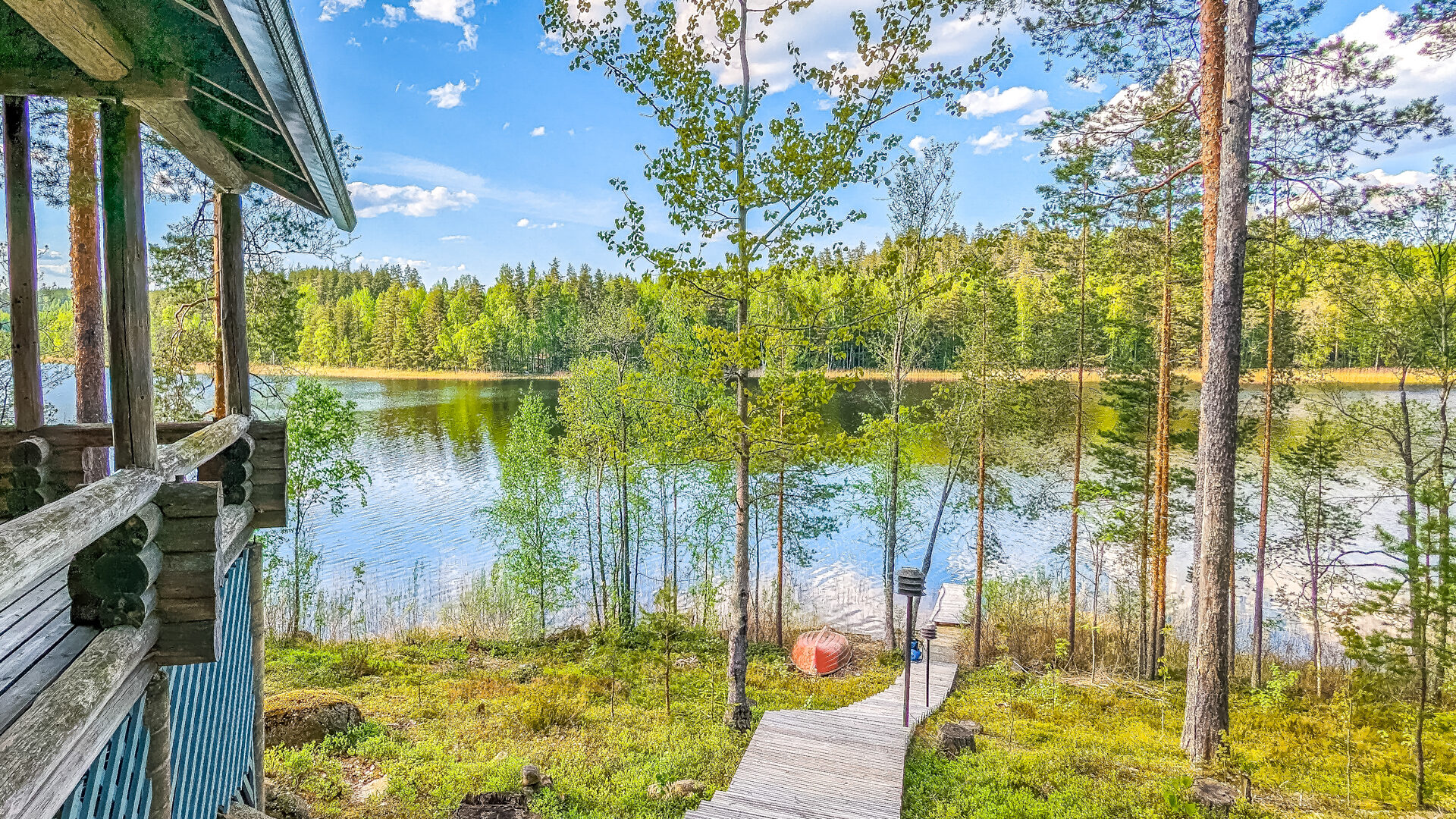Staircase to the lake and peer from sauna door at the cottage