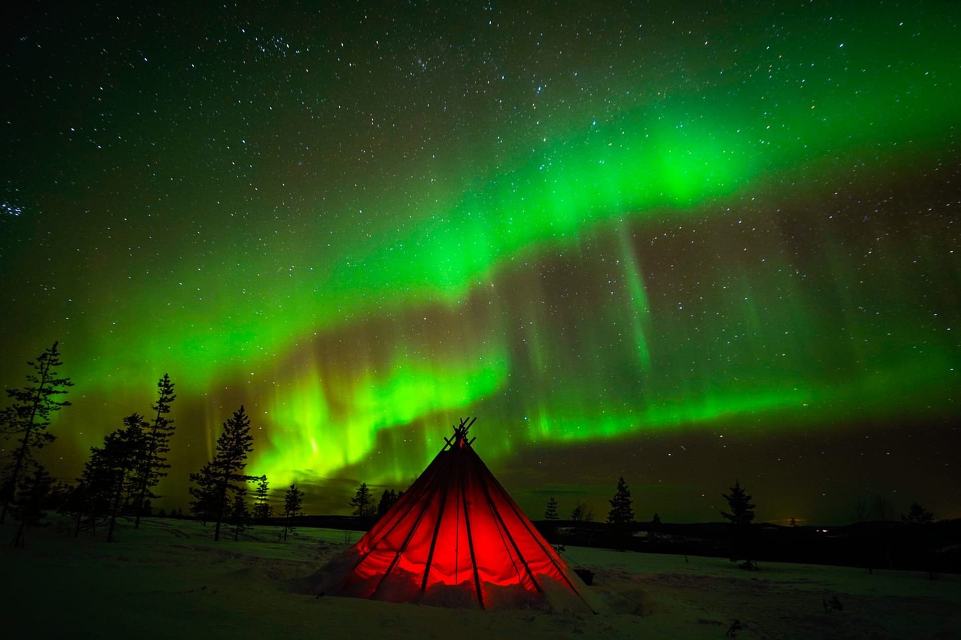 Aurora flowing beautifully over our Tipi