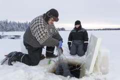 Ice fishing with a local guide