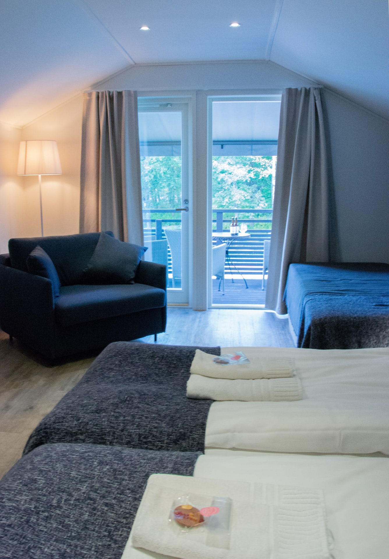 Upstairs room for 2-4 with balcony to the village side.