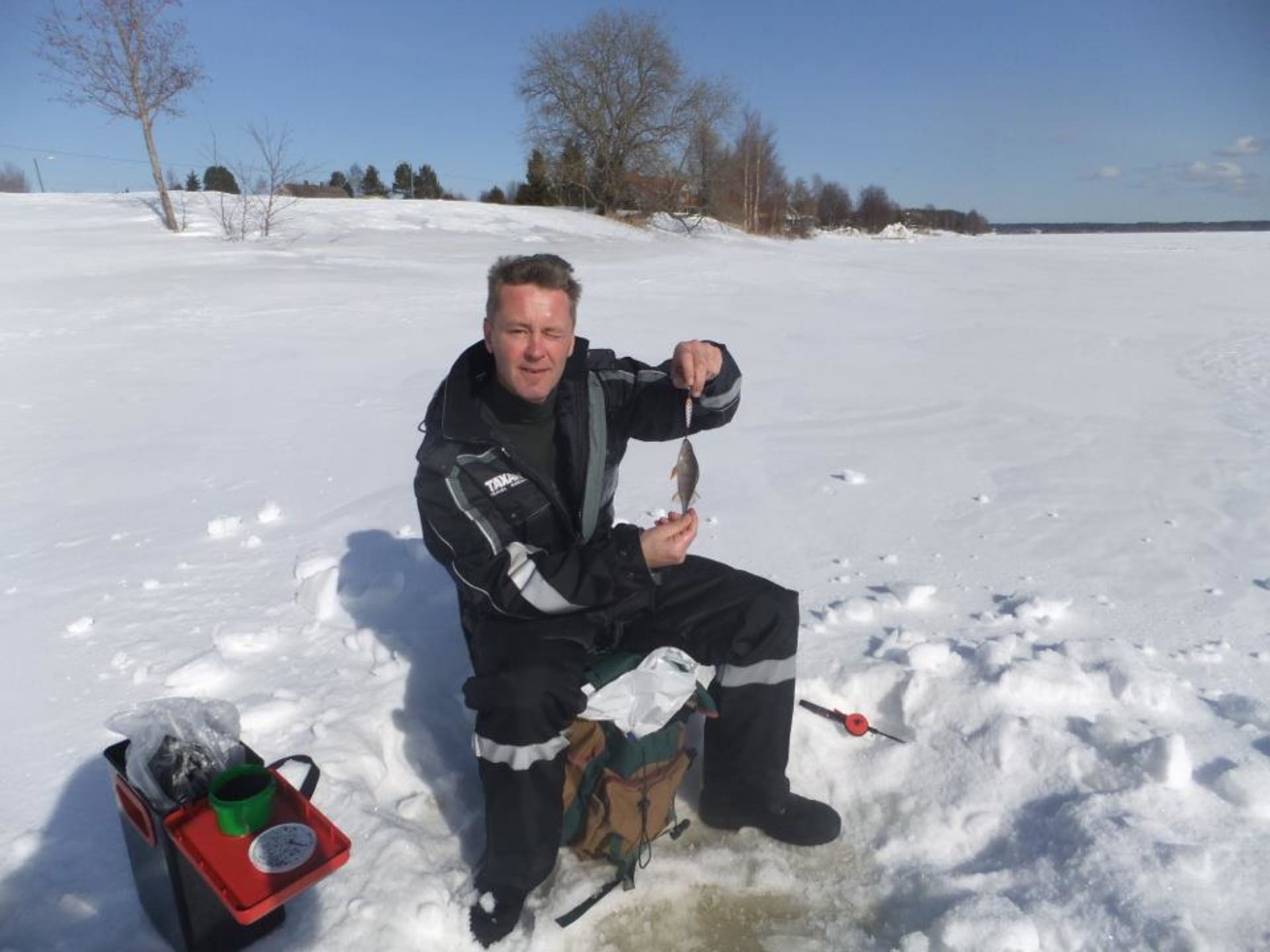 Ice fishing Sea Lapland