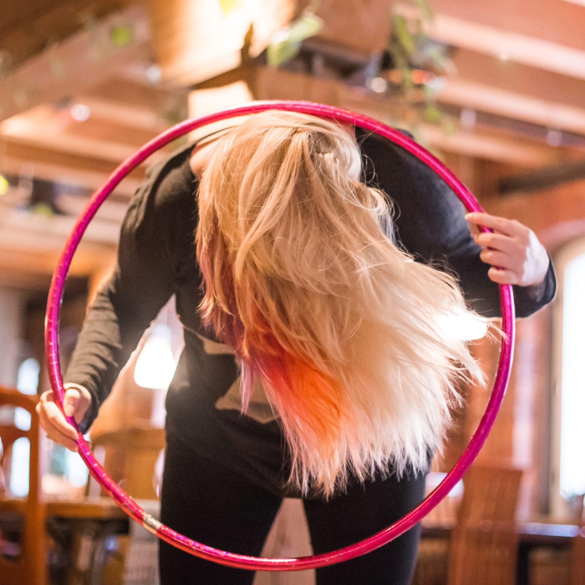 Girl playing hula hoop and having fun