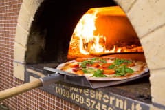 Rossos pizzas are made with real fire