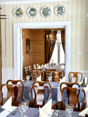 Messilä Manor Restaurant main hall and cabinet