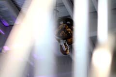 The historic Varikko brewery building glowing with summer lights