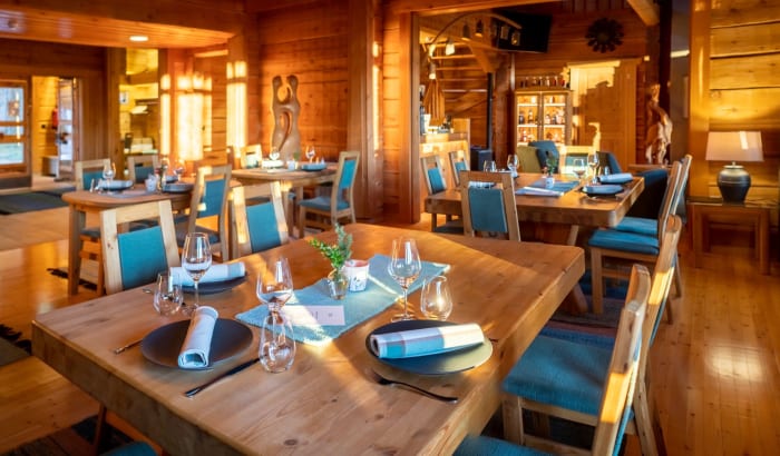 Restaurant Aihki is located in a cozy wooden lodge by the lake
