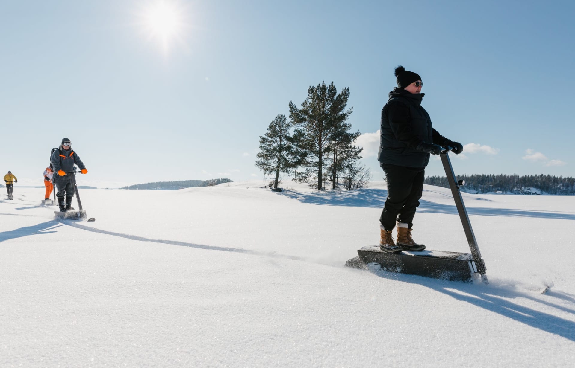 Snowsurfing by eLyly electric snow scooters in Puumala by lake Saimaa.