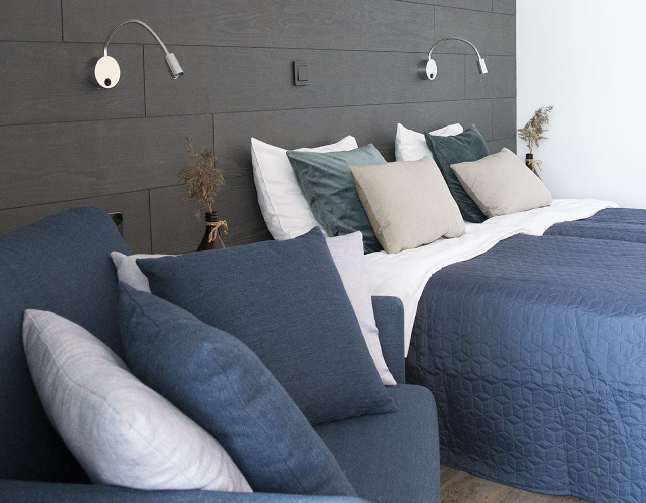 Upstairs room for two, bed and chair.