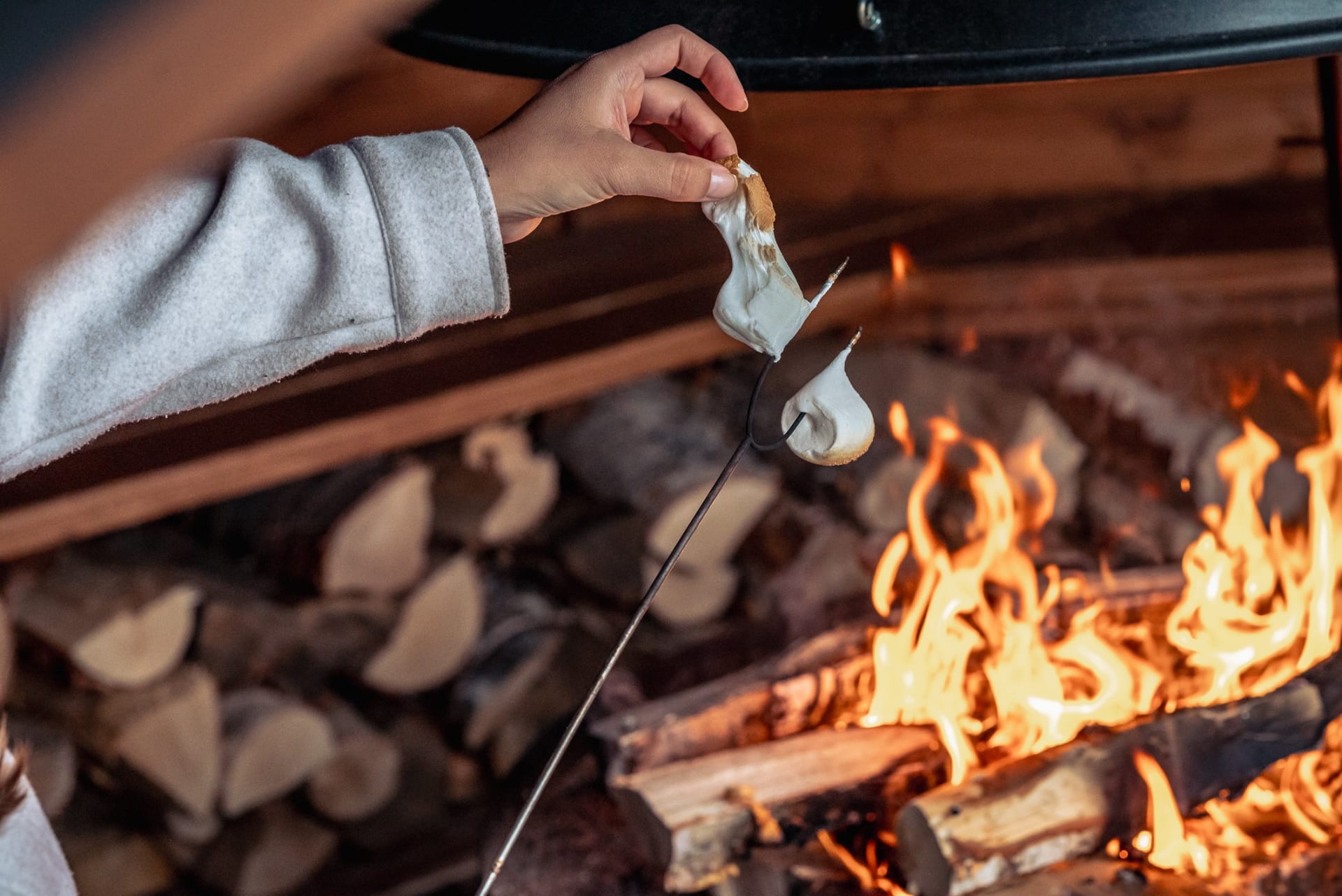 Grilling marshmallow in the yard