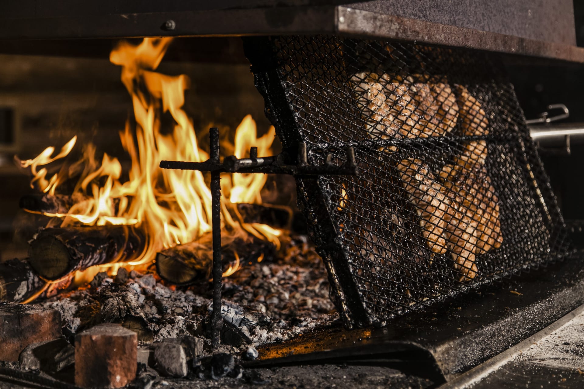 Glow-fried salmon by the fire in Kota Restaurant at Arctic SnowHotel in Rovaniemi, Lapland, Finland
