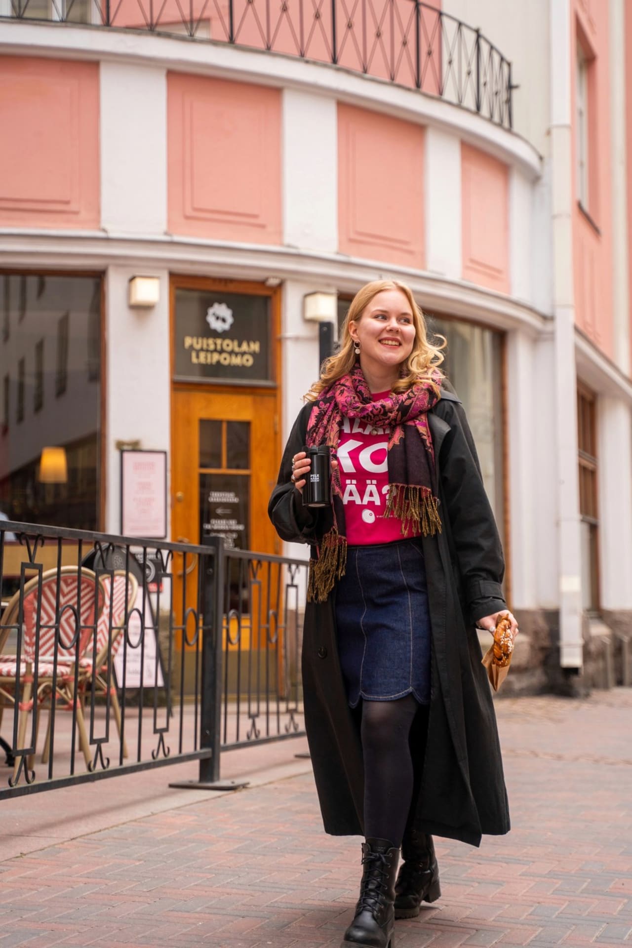 A person wearing a pink 