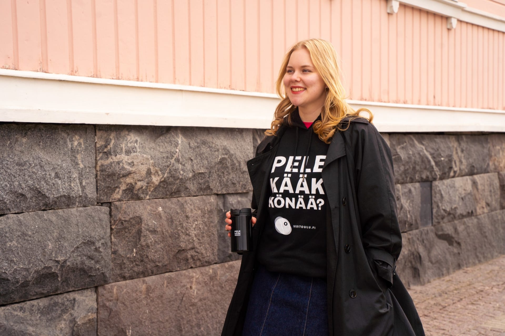 A person wearing a black 