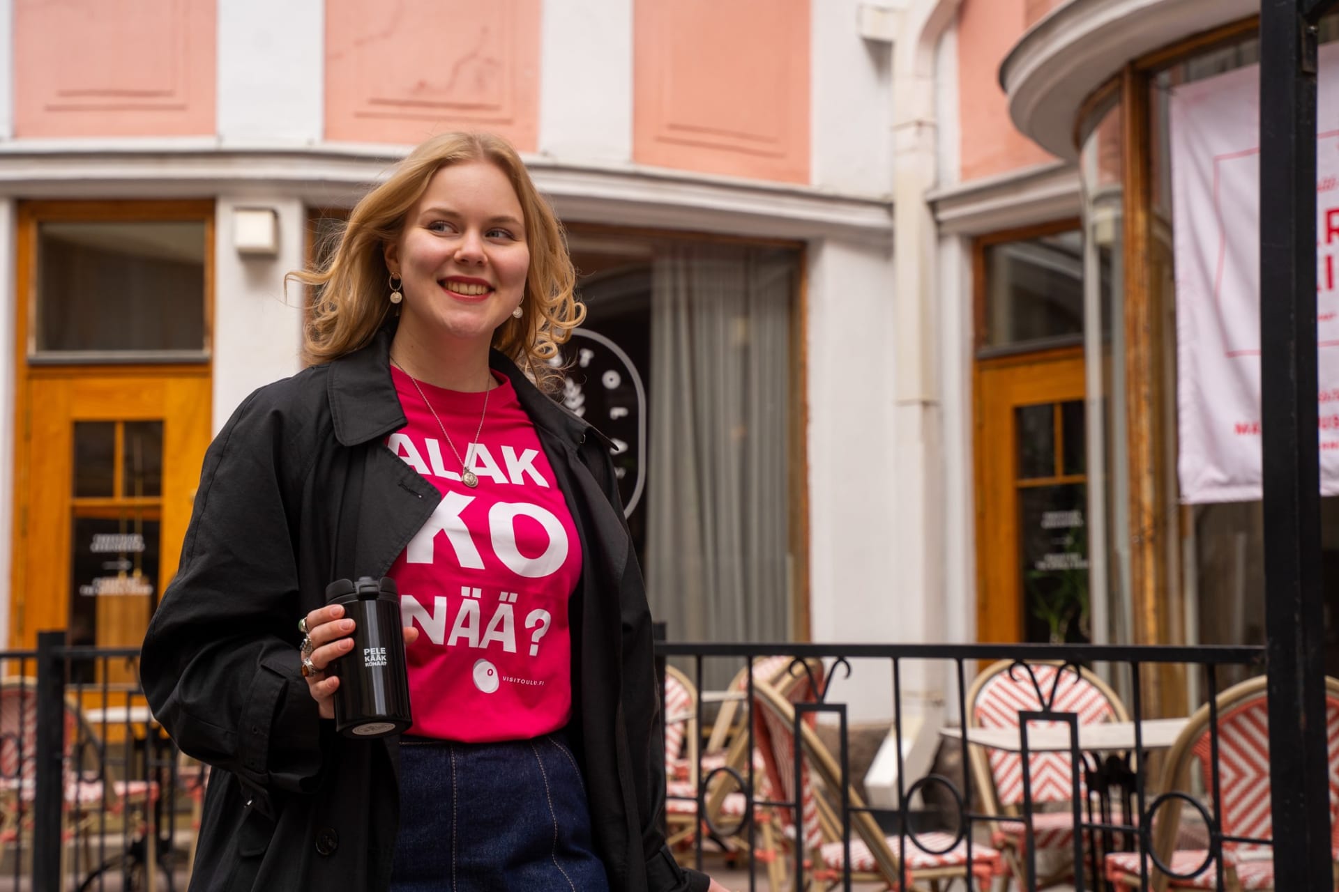 A person wearing a pink 