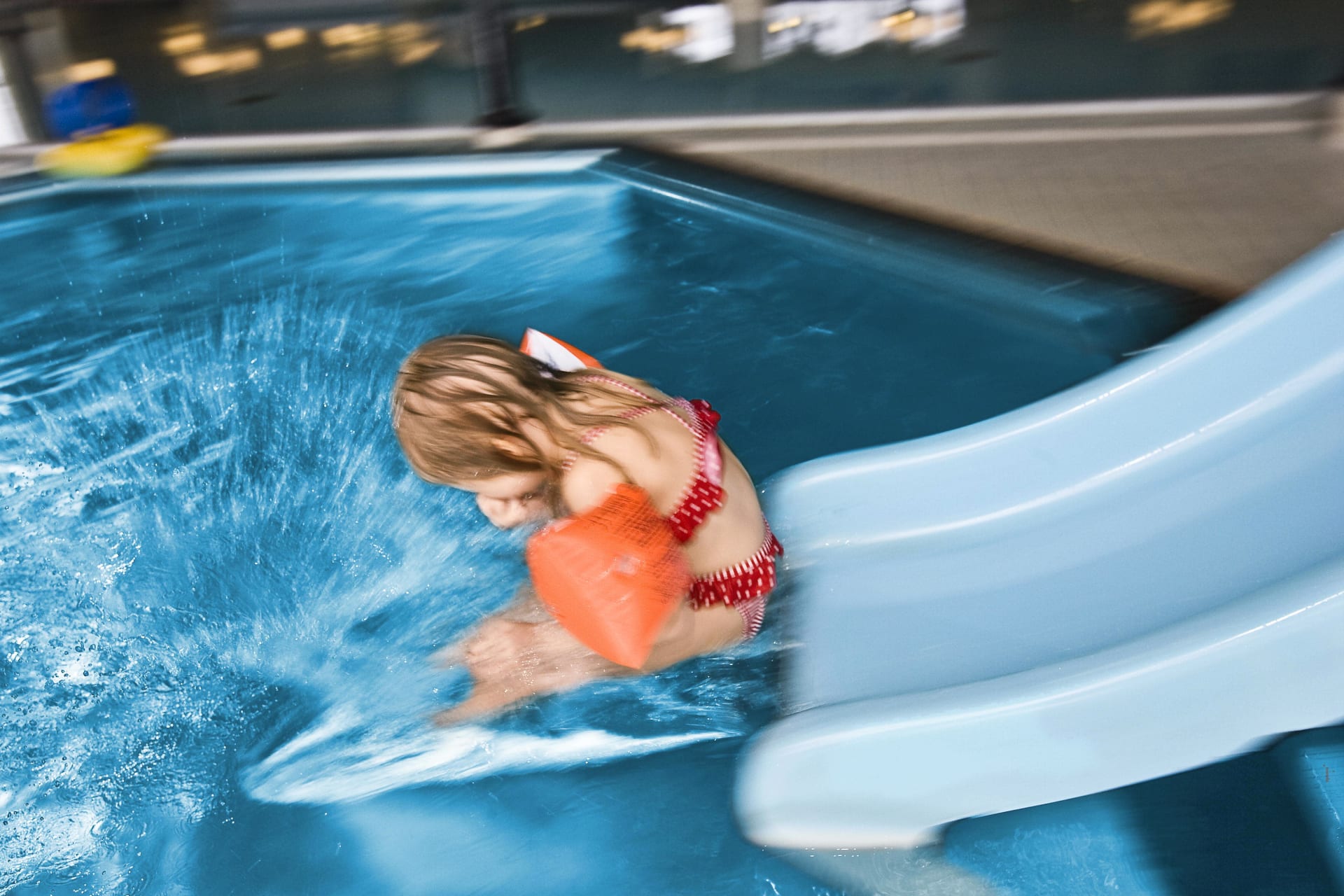 A child on a water slide at Spa Vesileppis