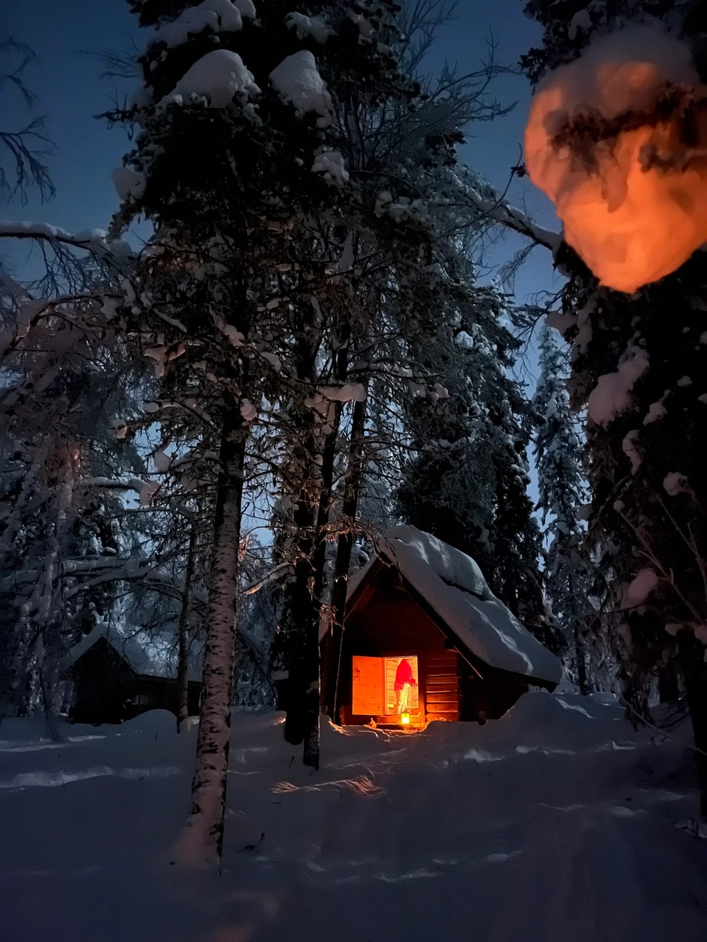 Warming up at a hut