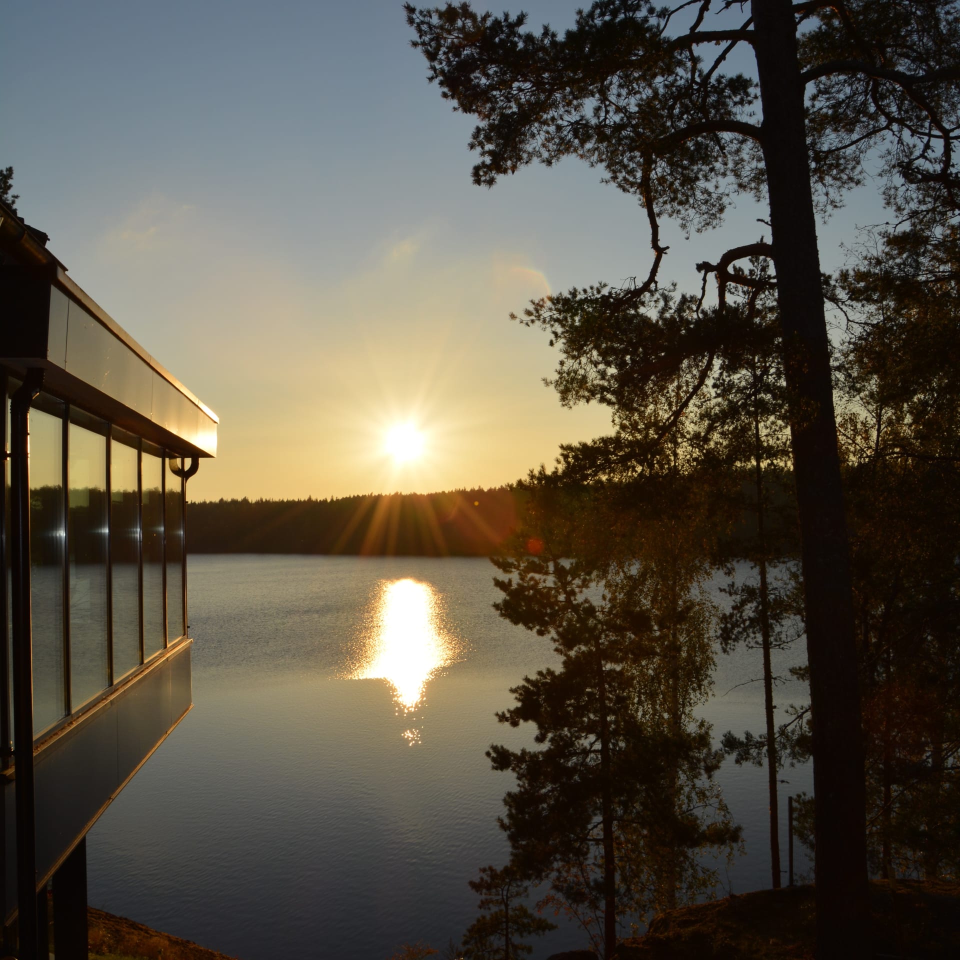 Lehmiranta Resort’s restaurant with lake views at sunset.