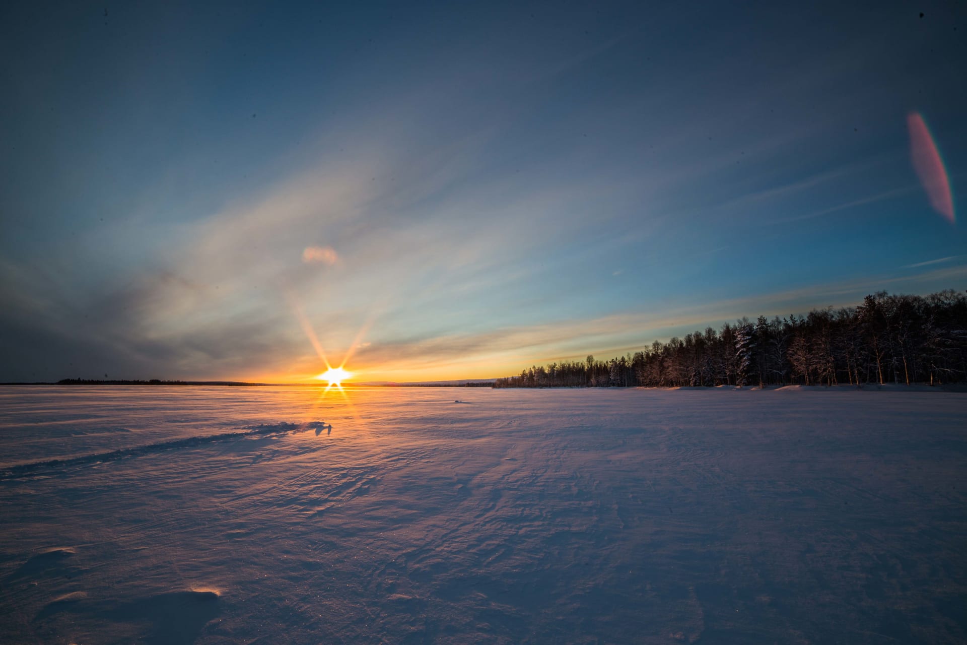 Frozen lake sunset.