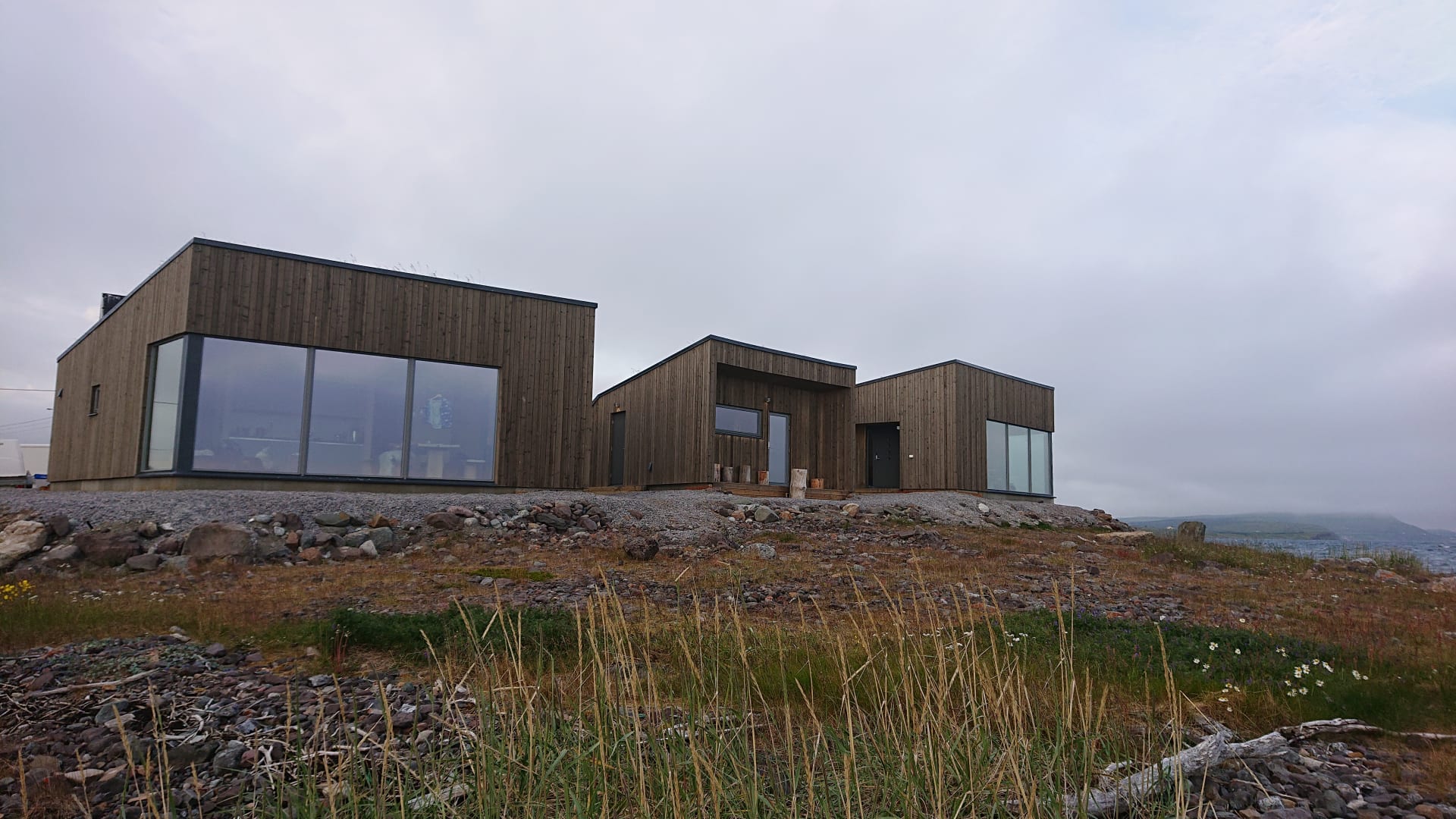 Cabins on the shore of Arctic ocean