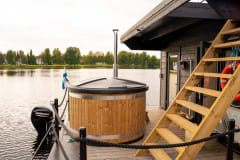 saunalautan palju taustalla oulujoki