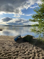 A rowing boat and a wide canoe from the shore are at your disposal.
