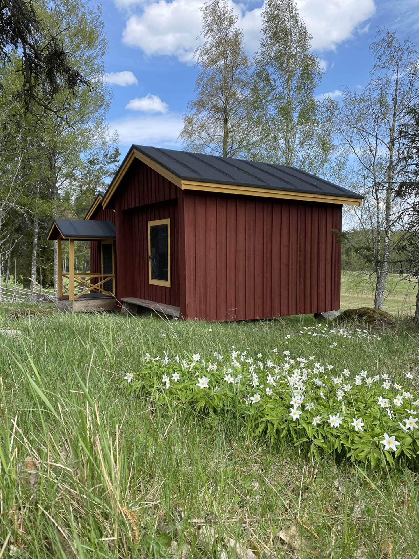 Storehouse cabins are located in the farm's environmentally-managed habitat.