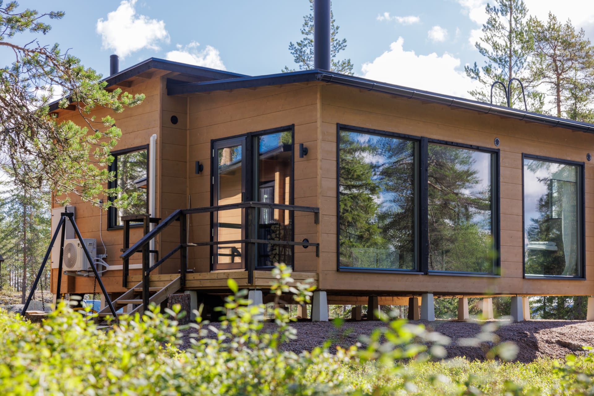 WALD Villas log cabin back yard summer