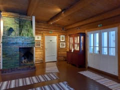 Green fireplace in the Artist Home Erkkola