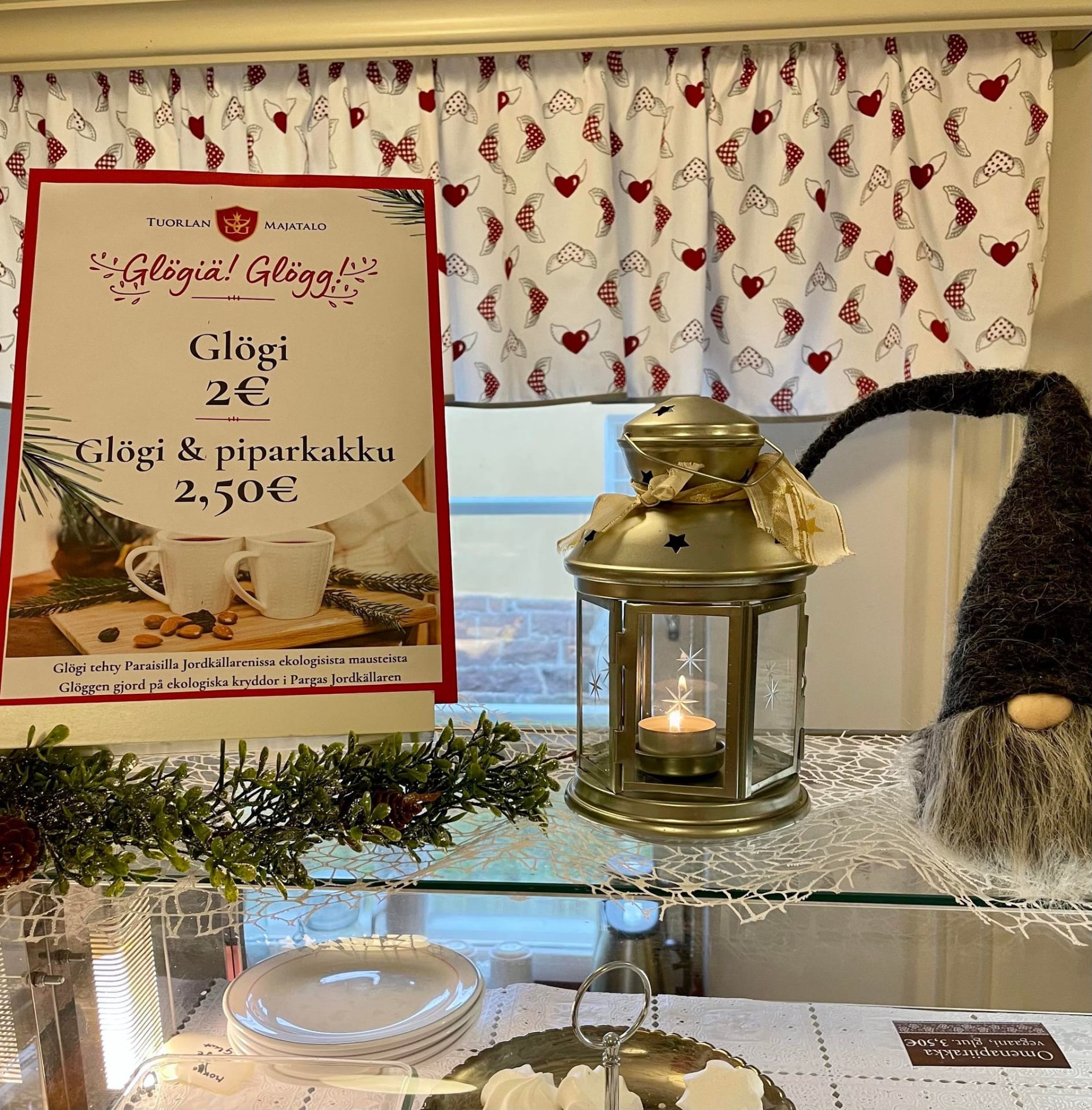 Christmas sign and a candle.  Christmas sign and a candle.