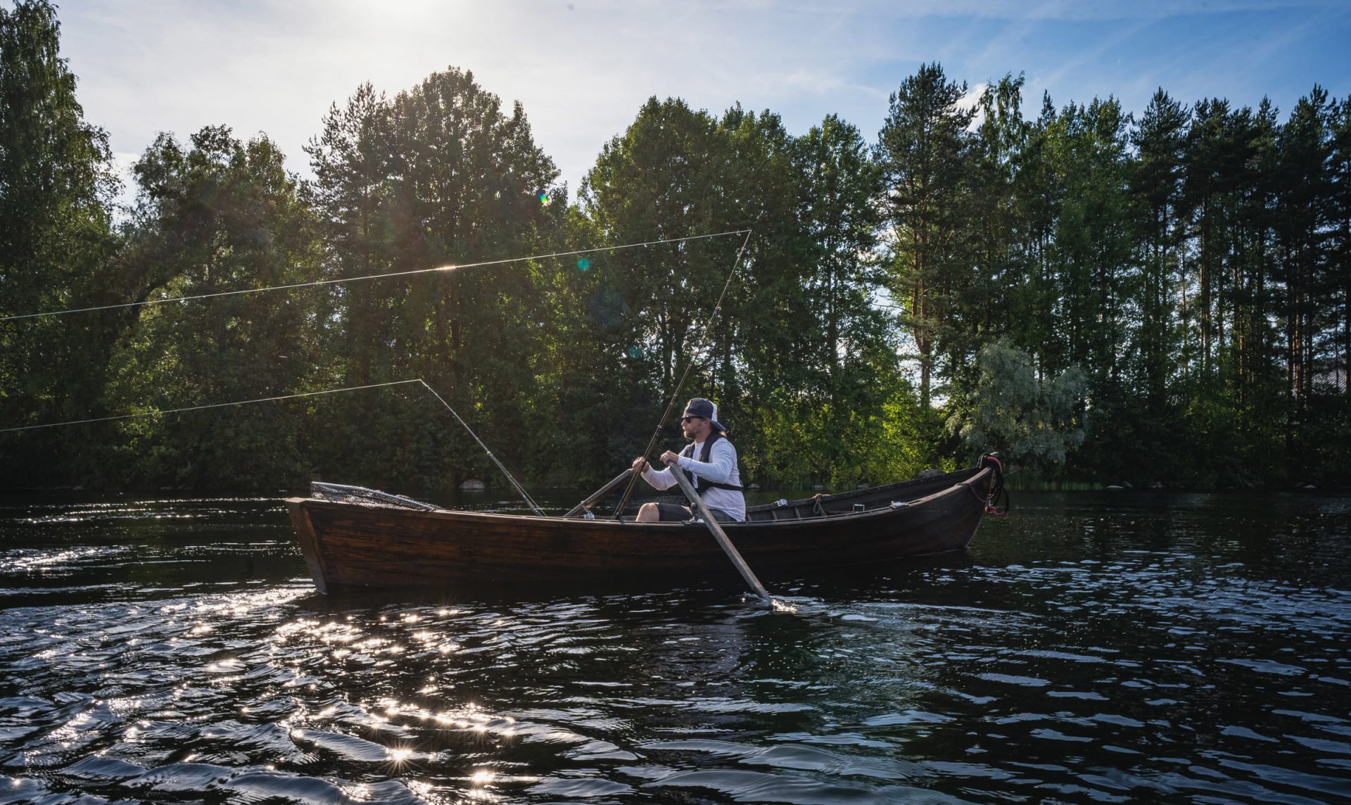 Wooden handmade boat and guide for your service