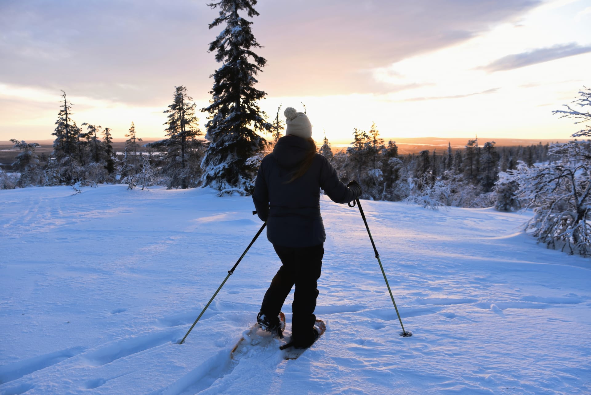 Snowshoeing in Lapland with winter clothing