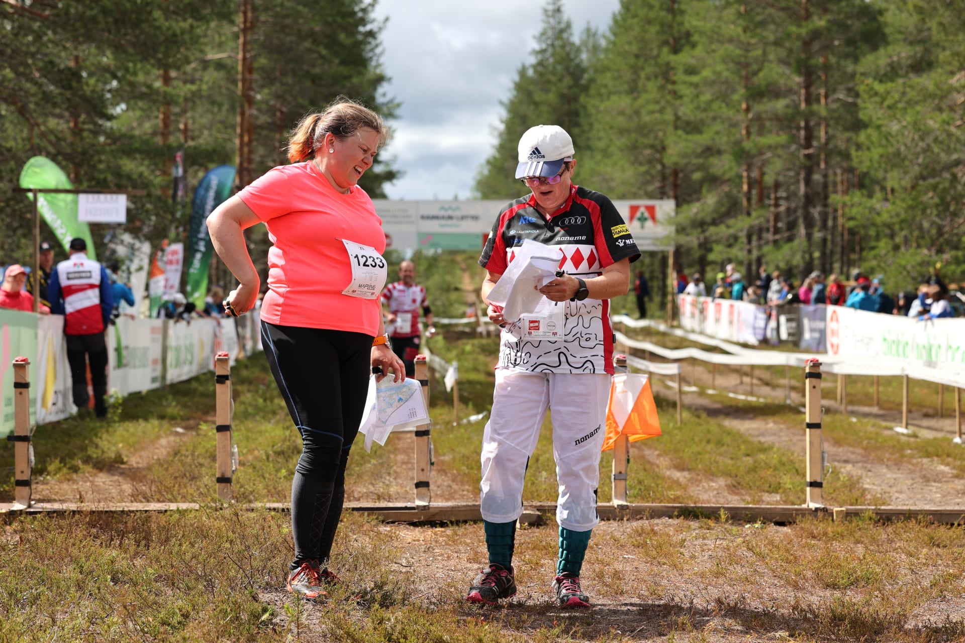 Two orienteers at the finishline of Kainuu O Week