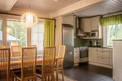 Well-equipped kitchen with dining area.