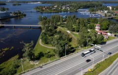 Bus driving on the street in Oulu.