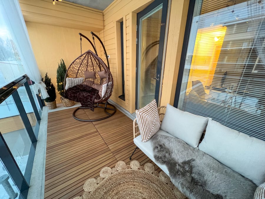 Cosy balcony with double sized swinging chair