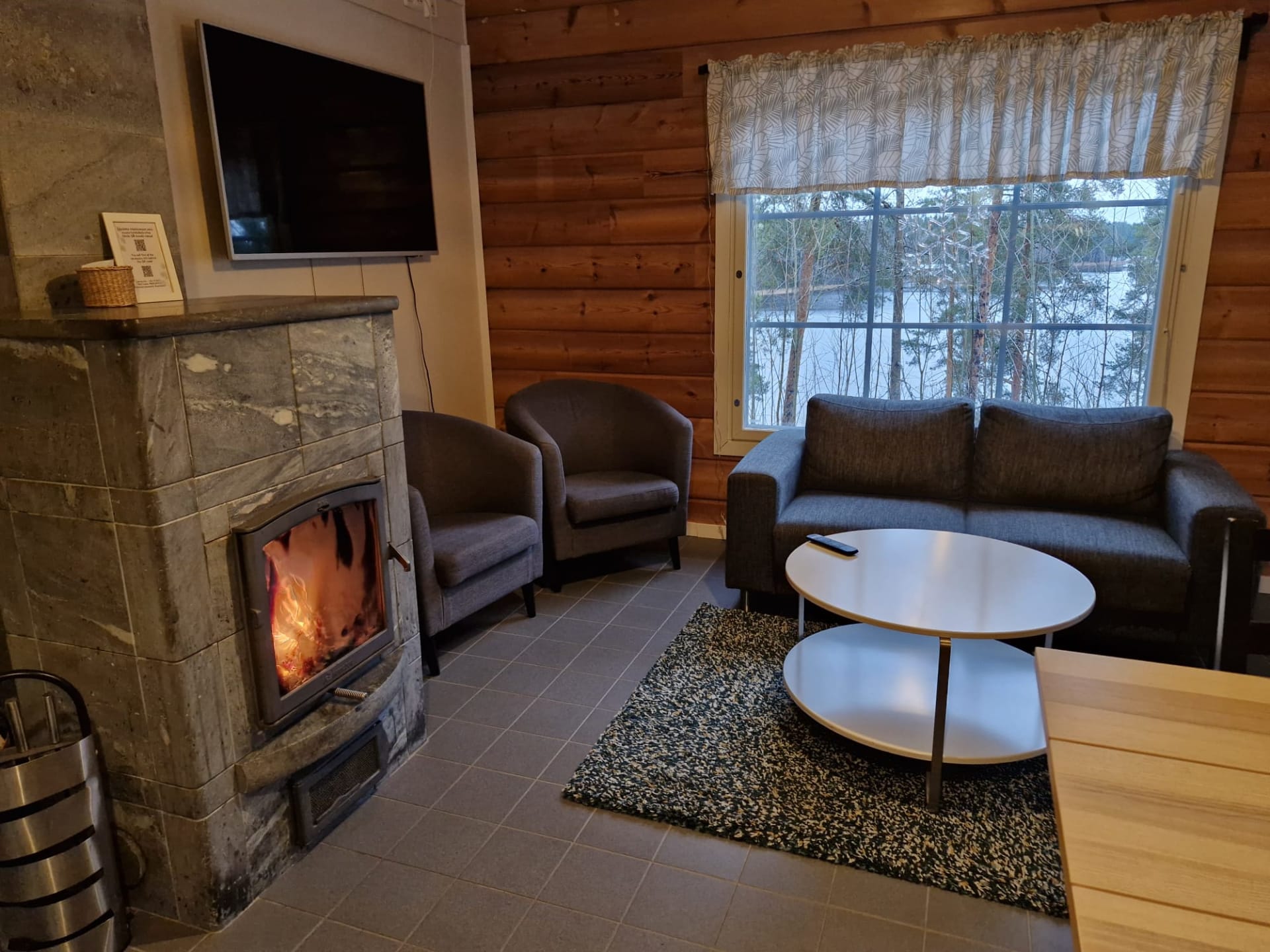 Rauhalahti holiday homes have a living room with a fireplace.