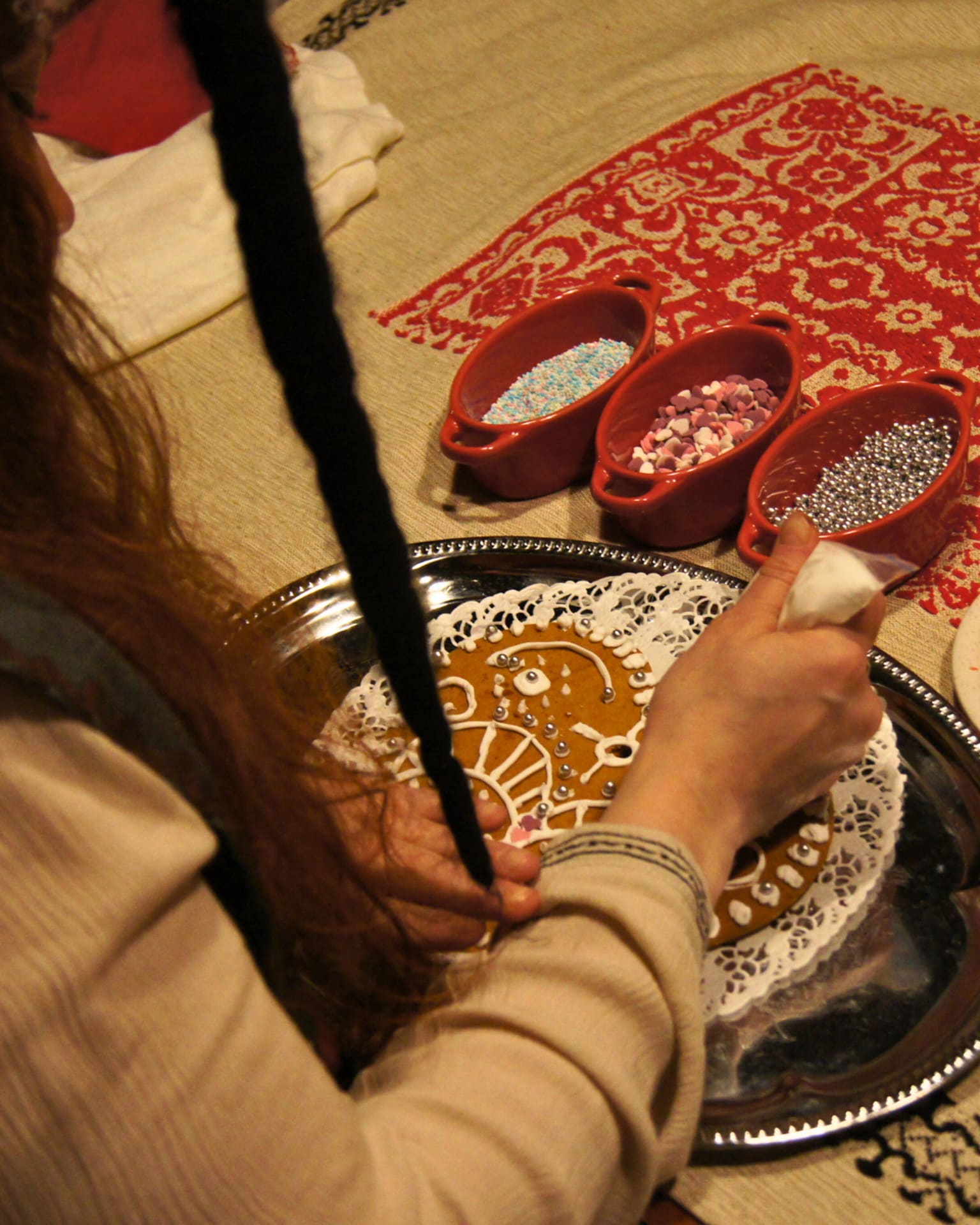 Decorating a large gingerbread